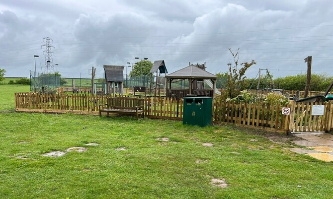 picket fencing around a playground